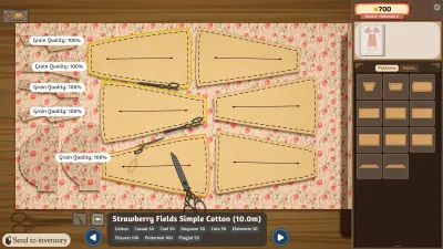 Dressmaker cutting table with paper pattern pieces laid out on printed cotton and a pair of scissors
