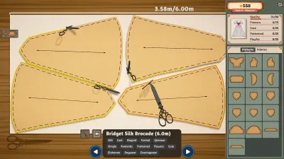 Dressmaker cutting table with pattern pieces placed on fabric and scissors ready to cut